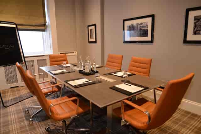 Howard Room at Oatlands Park Hotel, sleek meeting space for professional gatherings.