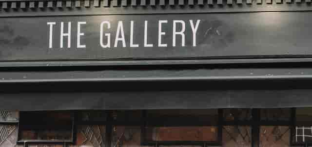 Stylish event venue "The Gallery" with sophisticated exterior for art exhibitions and gatherings.