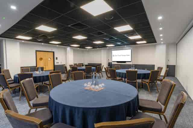 Palmer Room event space, round tables, corporate workshop