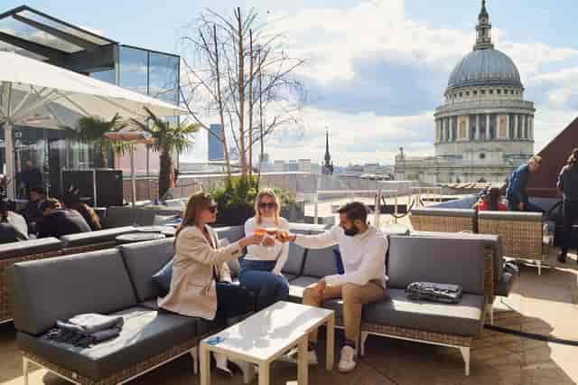 Stylish rooftop venue with St. Paul's Cathedral for networking events and social gatherings.