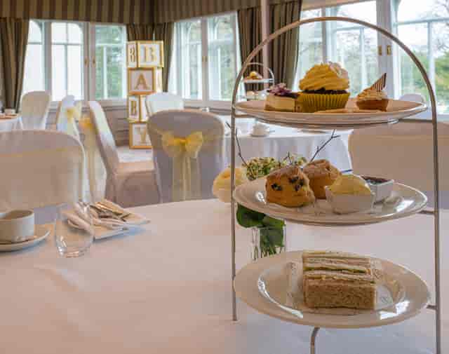 Baby shower afternoon tea at Norton House Hotel with elegant tiered catering and linen decor.