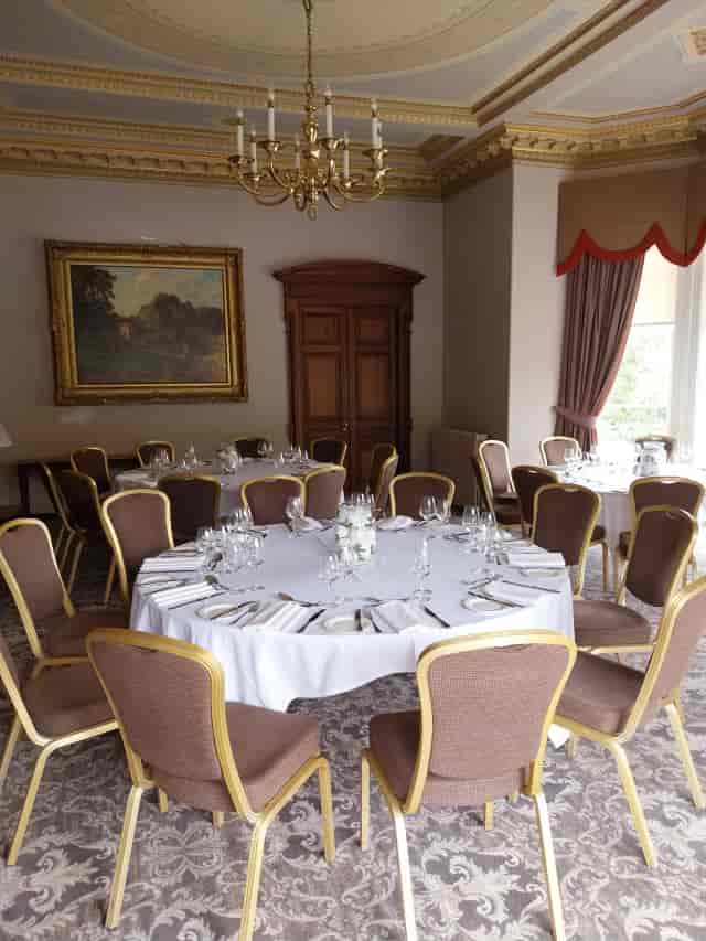 Banquet setup in Norton House Drawing Room for upscale boardroom lunch or gala dinner.