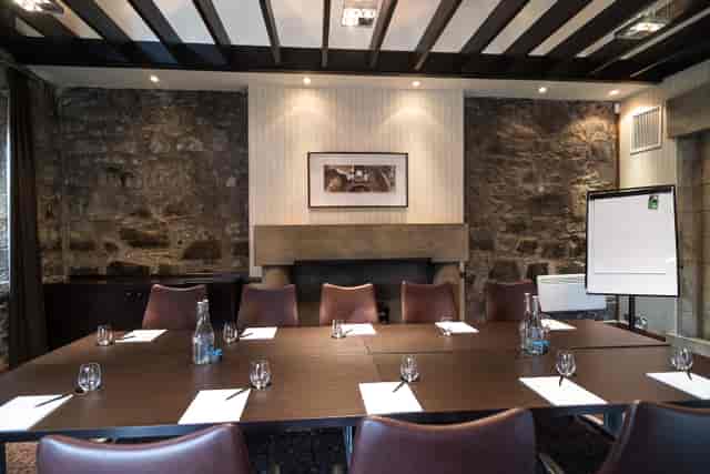 Rustic-chic boardroom at Norton House Hotel for executive meetings and corporate strategy sessions.