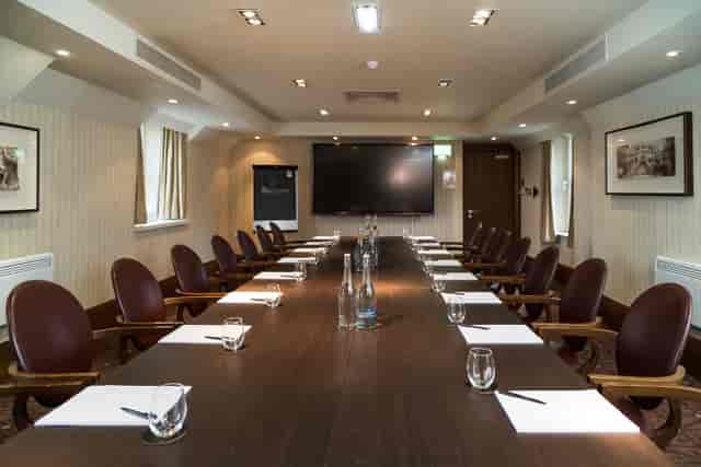 Boardroom setup at Norton House Hotel for corporate presentations and strategy sessions.