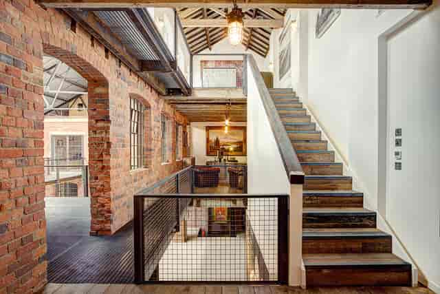 Stylish industrial-chic venue with exposed brick for meetings and events.