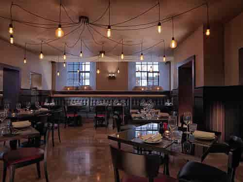 Chez Mal Brasserie in Leeds, stylish restaurant with warm lighting for events and gatherings.