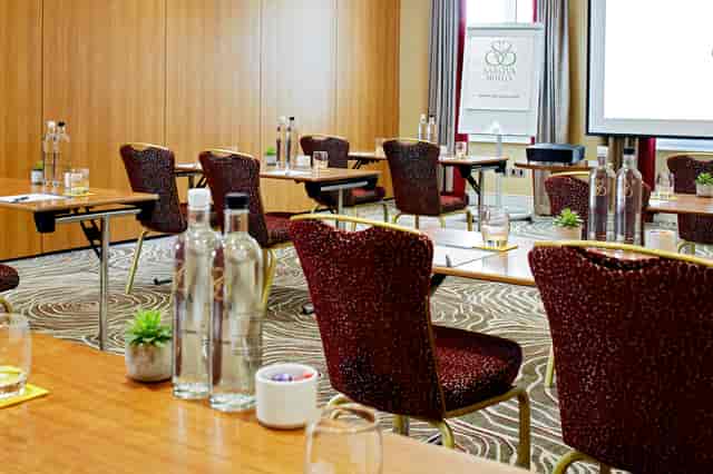 James Suite meeting room with modern decor, ideal for professional events and conferences.