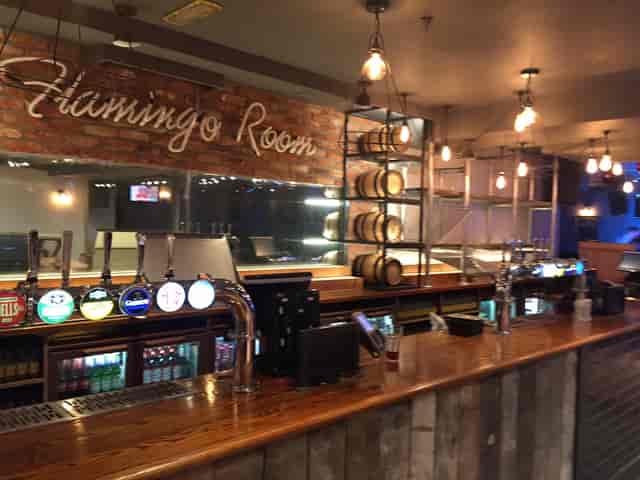 Stylish bar in Flamingo Room, O'Neill's for networking events and social gatherings.