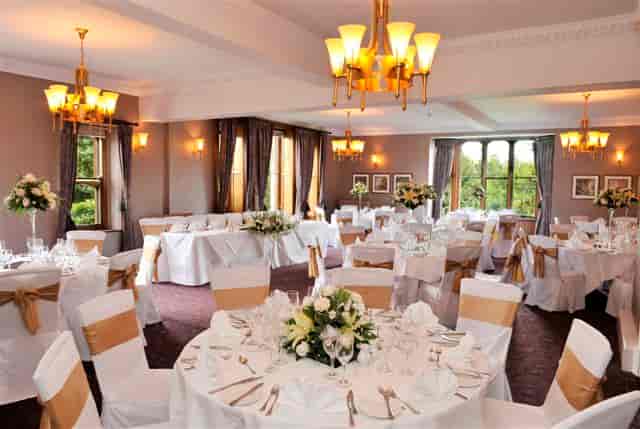 Elegant banquet hall at Nutfield Priory, perfect for weddings and formal events.