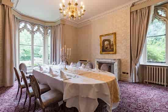 Elegant meeting space at Nutfield Priory, featuring a chandelier for corporate events.