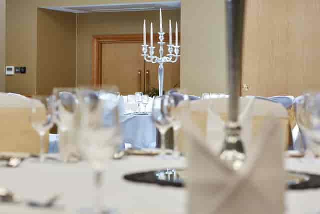 Elegant dining table in Buckingham Suite, The Bull Hotel for upscale events.