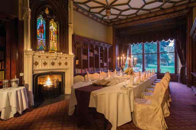 Elegant meeting space in Ettington Park Hotel with fireplace, ideal for corporate retreats and celebrations.