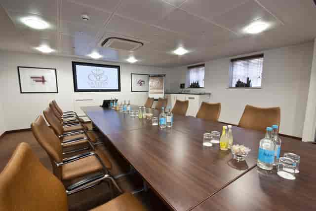 Buckingham Suite meeting room with modern decor, ideal for professional events.
