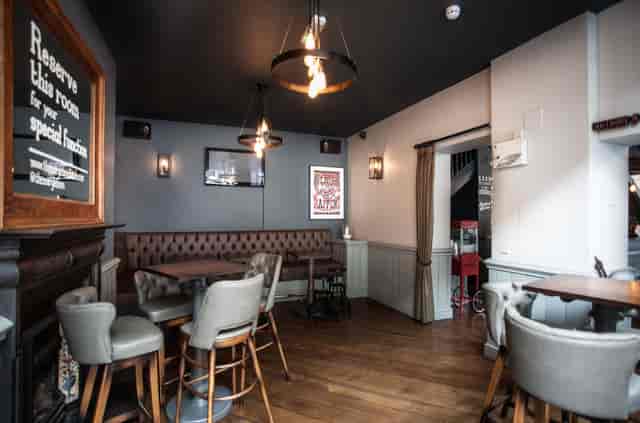 Stylish bar with warm lighting, ideal for intimate meetings and events in Marylebone.