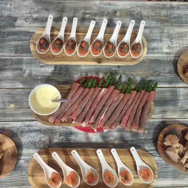 Gourmet appetizer display for private hire events with vibrant food presentation.