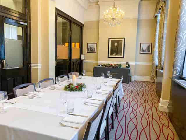 Worsely Room meeting space with elegant table setting for intimate gatherings.