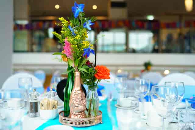 Elegant table setting with floral centerpiece at Holiday Inn Camden Lock event venue.