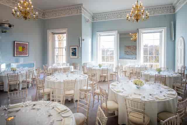 Beatrice Webb Room with elegant round tables, ideal for weddings and corporate events.