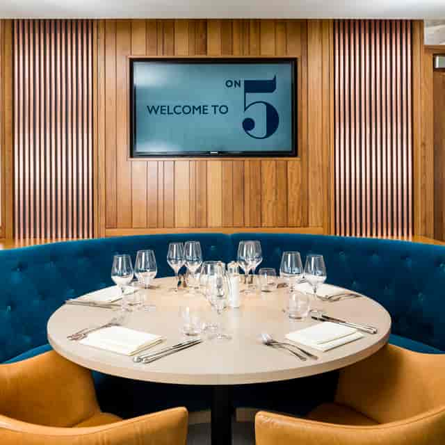Elegant dining setup in On 5 Suite, Ascot Racecourse for intimate meetings and events.
