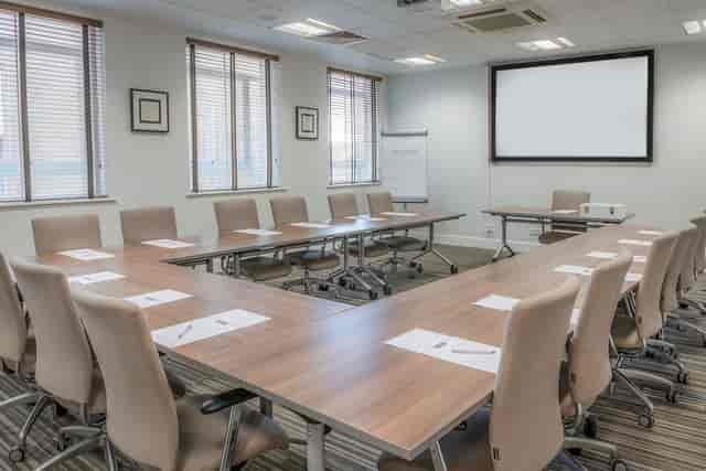 U-shaped meeting room at De Vere West One for interactive workshops and board meetings.