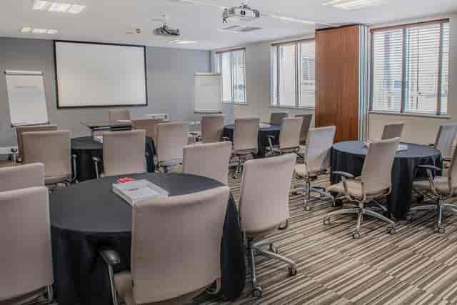 Cabaret-style meeting room in De Vere West One for corporate workshops and breakout sessions.