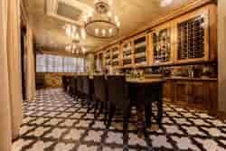 Sophisticated meeting space with wooden table, ideal for executive gatherings and networking.