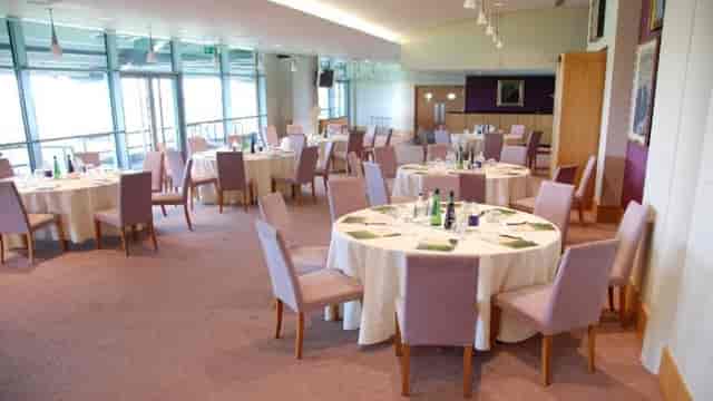 Ascot Authority Suite with round tables, ideal for corporate meetings and elegant gatherings.