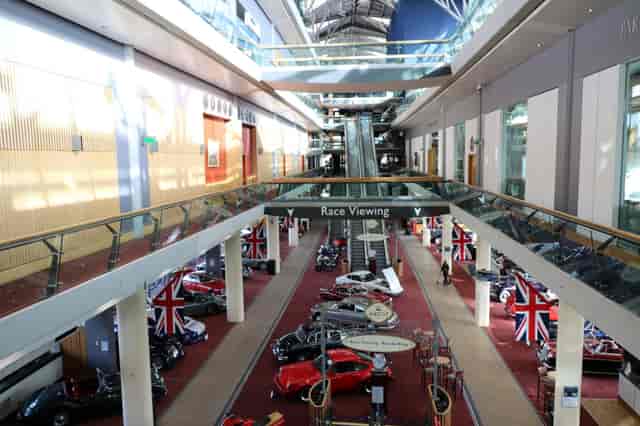 Grandstand Concourse at Ascot Racecourse with vintage cars for automotive exhibitions.