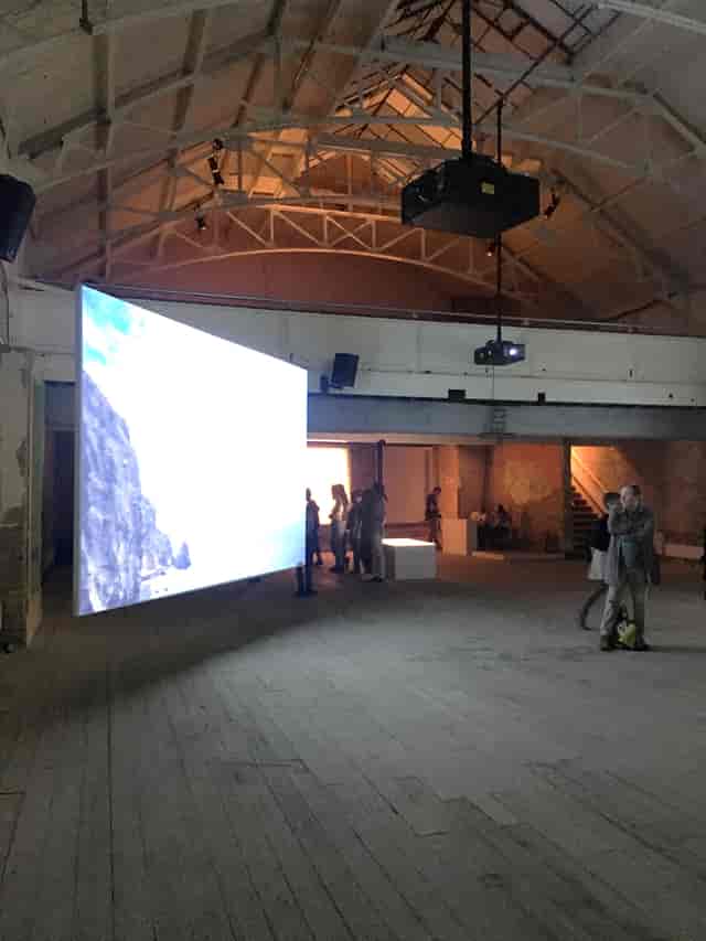 Double Height Auditorium at 133 Rye Lane, spacious industrial venue for events and presentations.