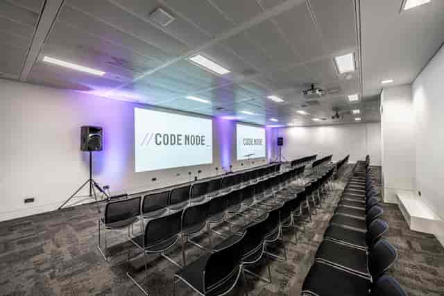 CMD CodeNode event: modern venue, tiered seating.