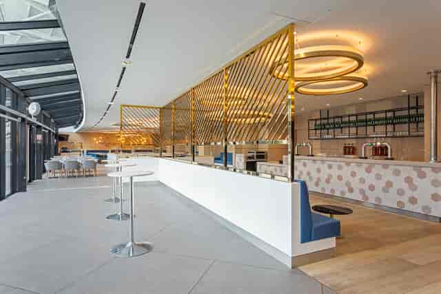 Modern event space at The Royal East, London Stadium, ideal for networking and receptions.