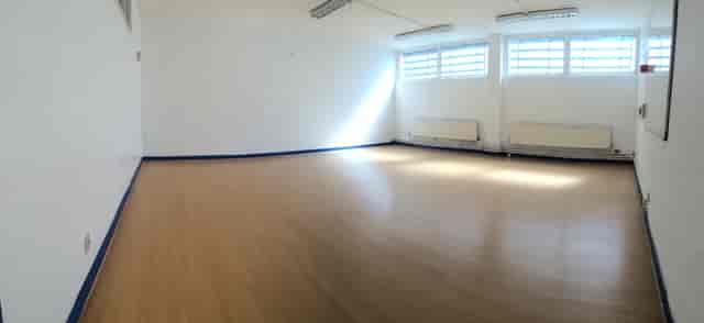 Spacious, well-lit meeting room at Centre 151 for workshops and brainstorming sessions.