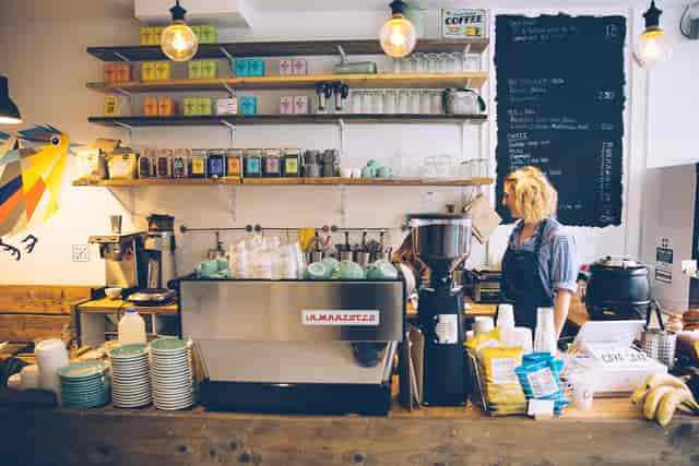 Cozy café setting with vibrant decor for casual networking events and meetings.