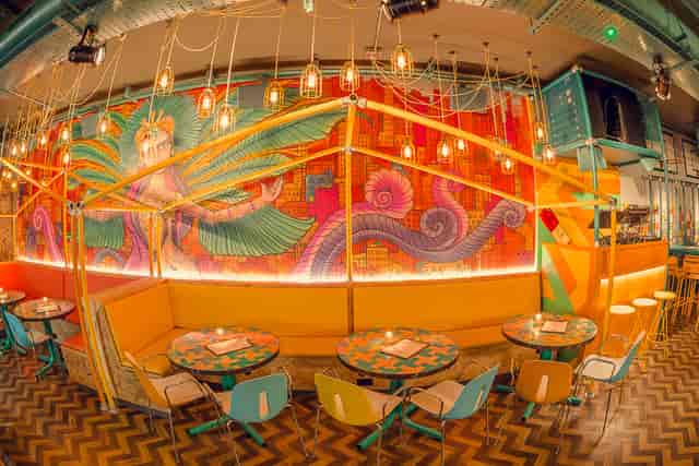 Vibrant Barrio Brixton venue with modular seating for corporate networking and mixers.