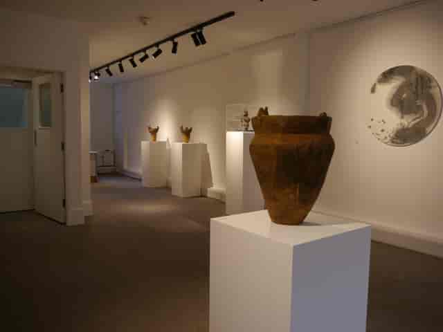 Minimalist 2nd Floor gallery with elegant lighting for art exhibitions and corporate events.