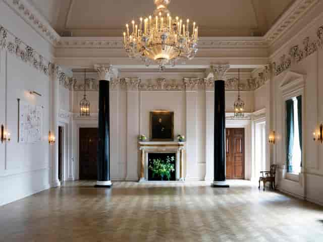 Elegant event space at The Ned with high ceilings, ideal for corporate gatherings.