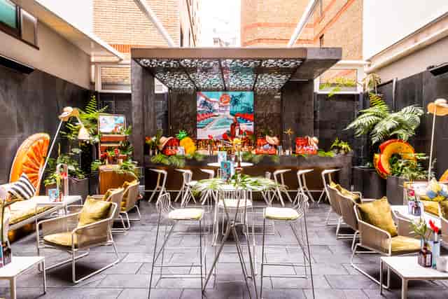 Vibrant outdoor event space at The Secret Garden, ideal for casual gatherings and networking.