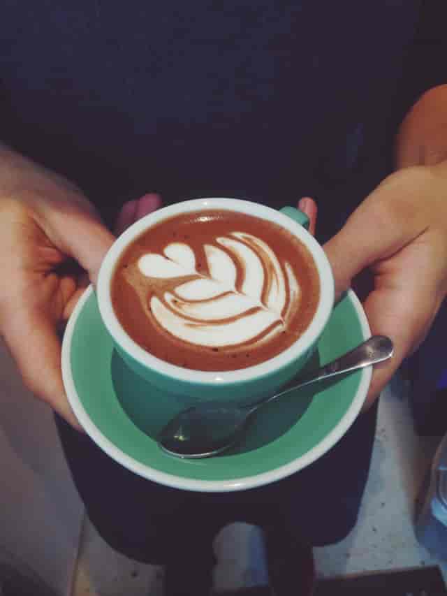 Hot chocolate with latte art at CAYA Event Space for inviting networking breaks. 