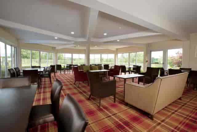 Spacious Sandford Lounge with natural light, perfect for networking events and gatherings.