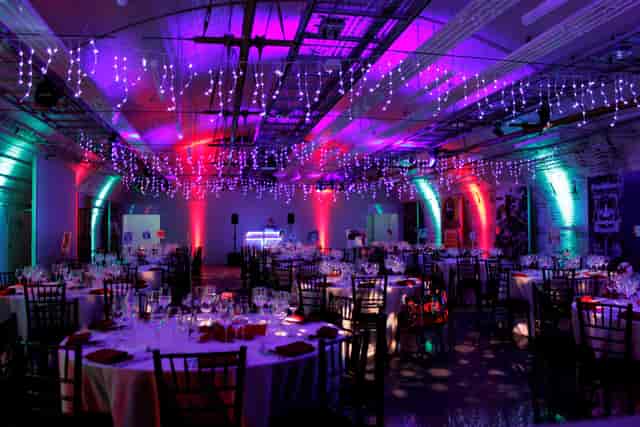 Elegant round tables in Mail Rail, The Postal Museum, ideal for corporate events and celebrations.