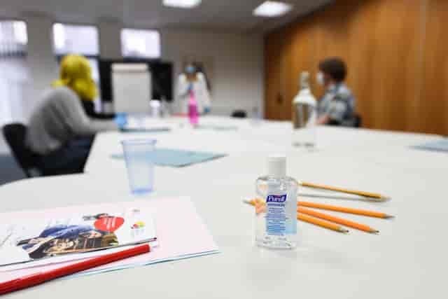 Seminar Room at The Brain Charity with hand sanitizer for safe, collaborative meetings.
