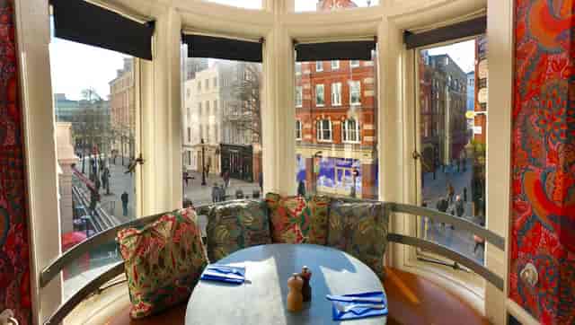 Cozy restaurant corner in Nags Head, ideal for casual gatherings and meetings.