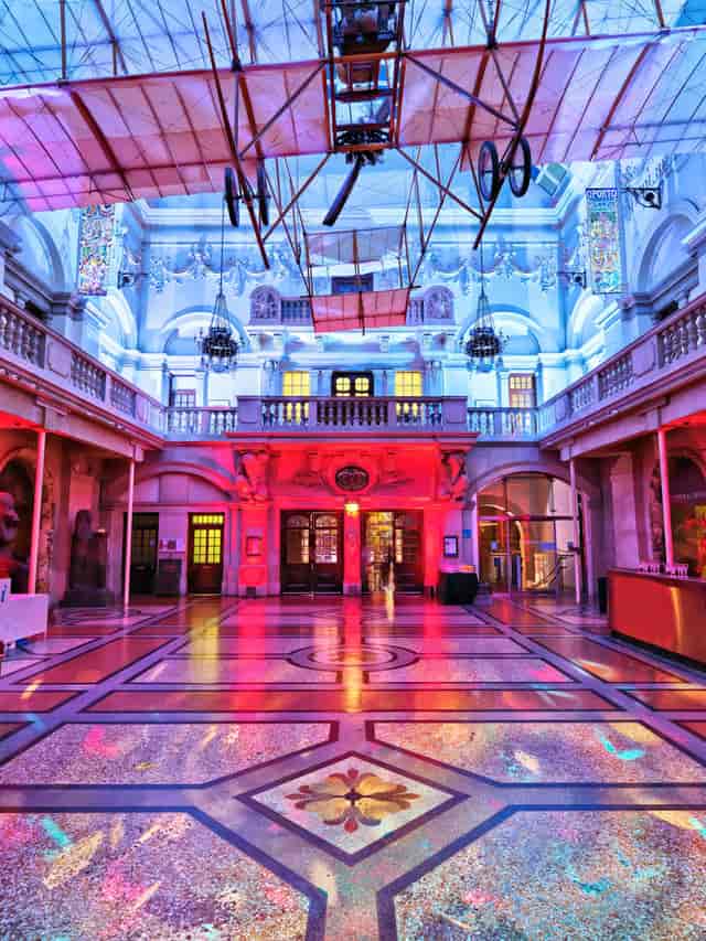 Elegant event space in Bristol Museum with vibrant lighting for corporate and social gatherings.