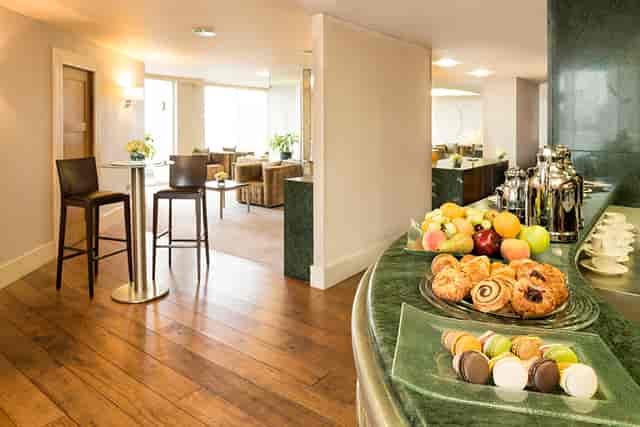 Executive Boardroom at Chelsea Harbour Hotel with stylish refreshment area for meetings.