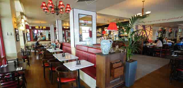 Vibrant dining space at Café Rouge Greenwich for casual meetings and events.