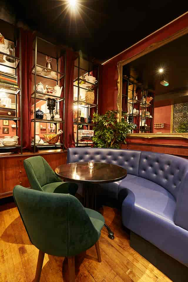 Cozy seating area in Back Lounge, Little Bat for intimate meetings and gatherings.
