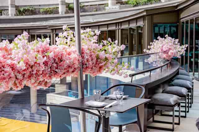 Yauatcha City terrace with floral decor for premium dining and networking events.