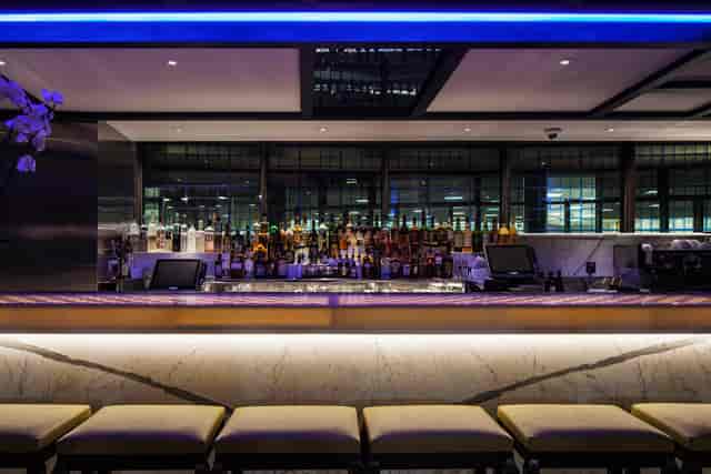 Sleek modern bar in Yauatcha City, ideal for networking events and social gatherings.