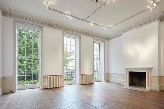 Versatile event space in Fitzroy Square House with natural light, ideal for meetings and gatherings.