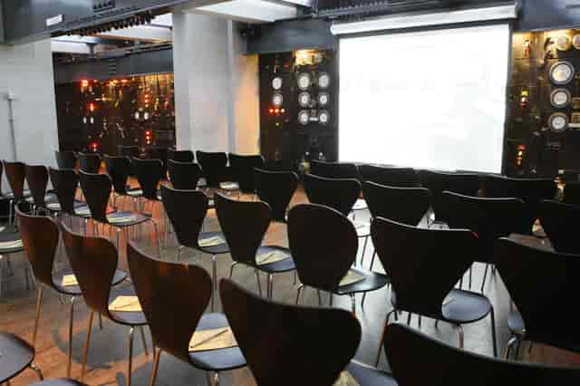 Harmsworth Room in Churchill War Rooms, sleek chairs for presentations and workshops.
